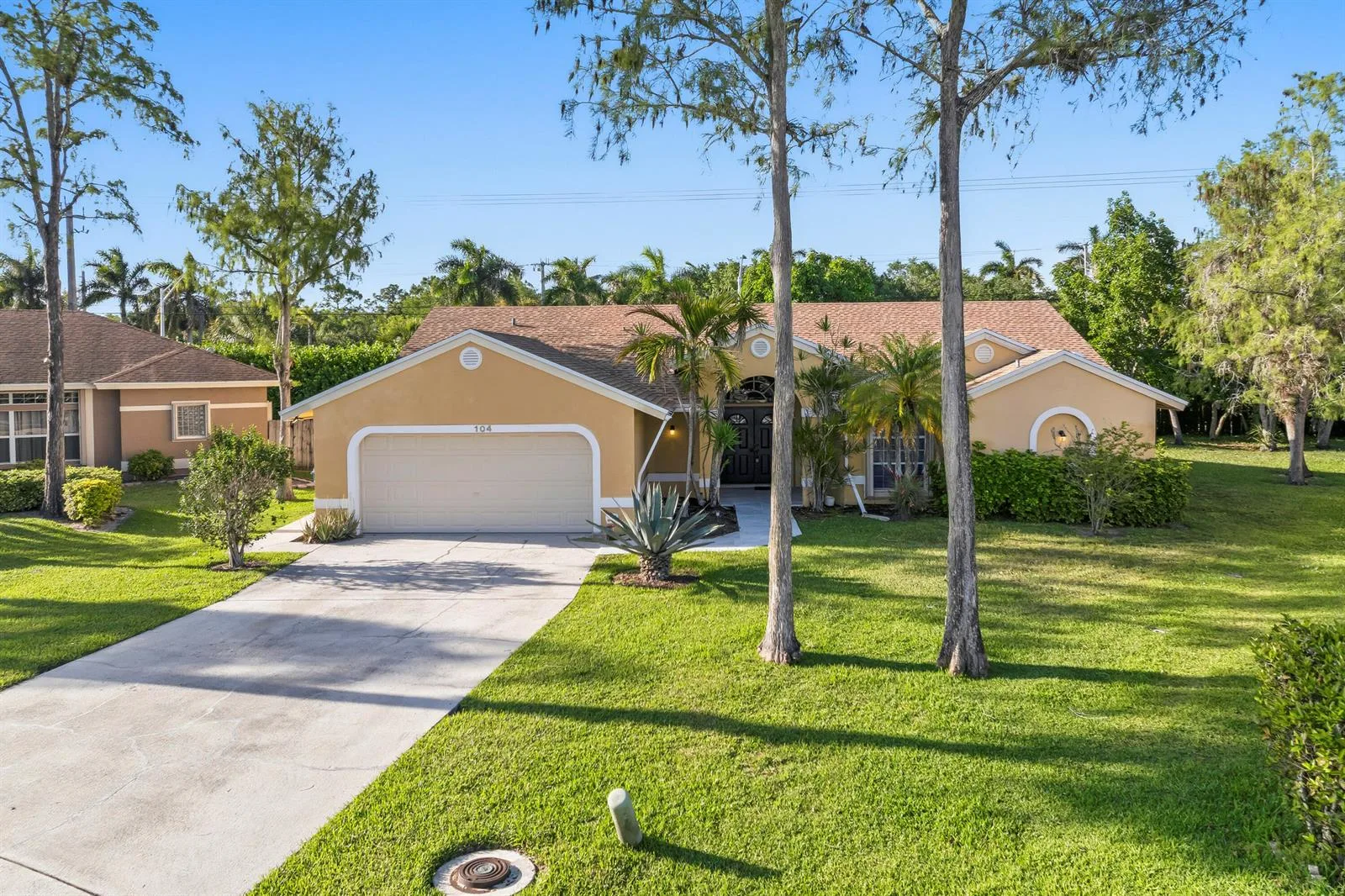 104 Oxford Court, Royal Palm Beach, FL 33411