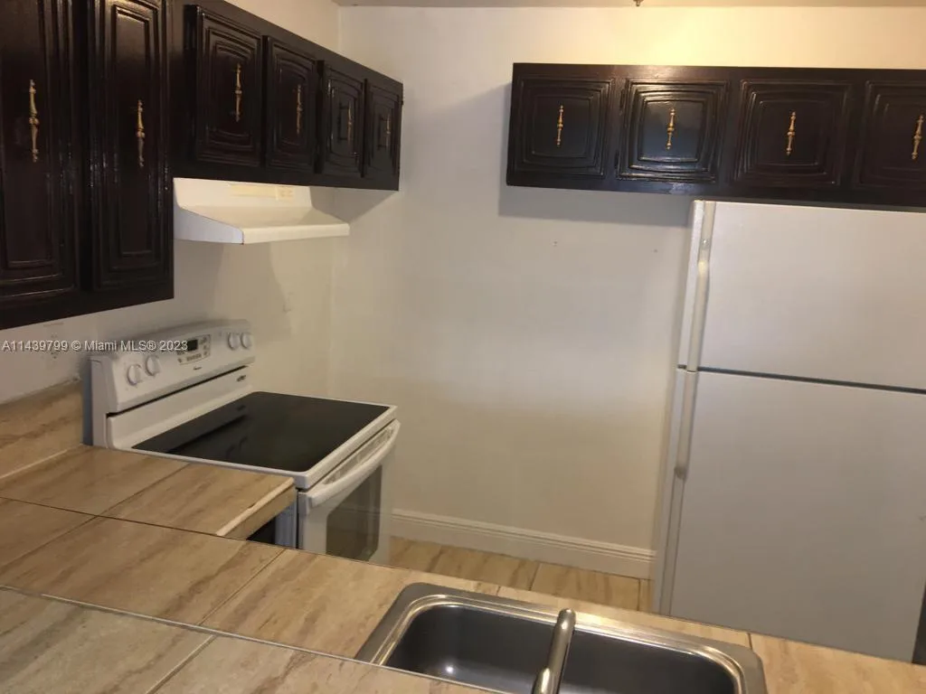 498 NW 165th St Rd # D205, Miami, FL 33169 photo 2