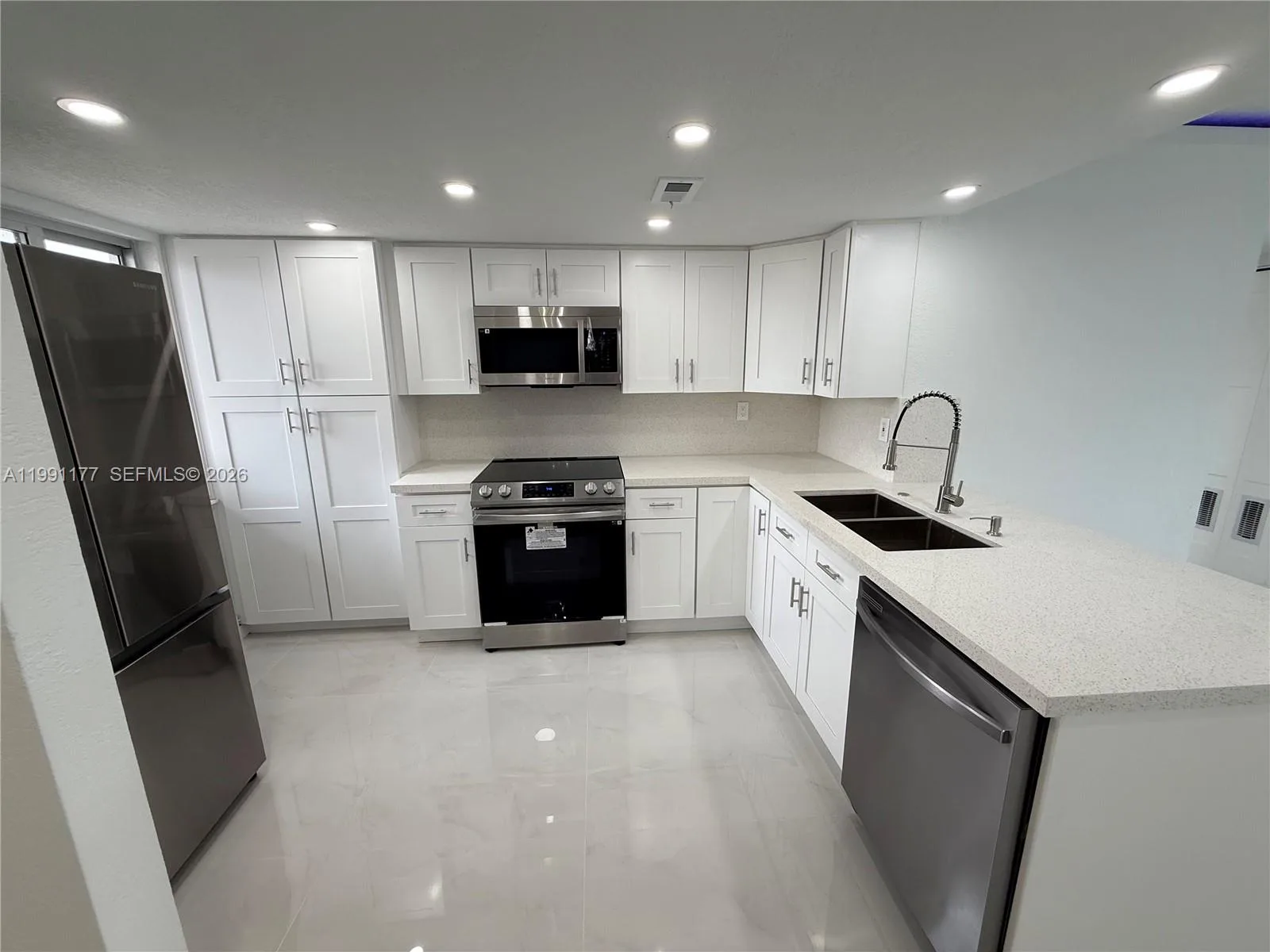 9915 W Okeechobee Rd # 2-201, Hialeah Gardens, FL 33016 photo 2