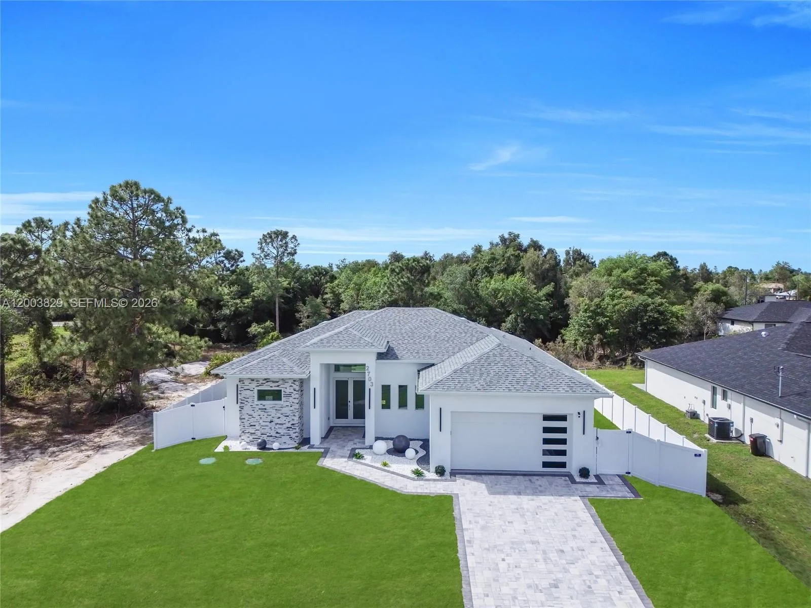 2703 34th ST SW, Lehigh Acres, FL 33976