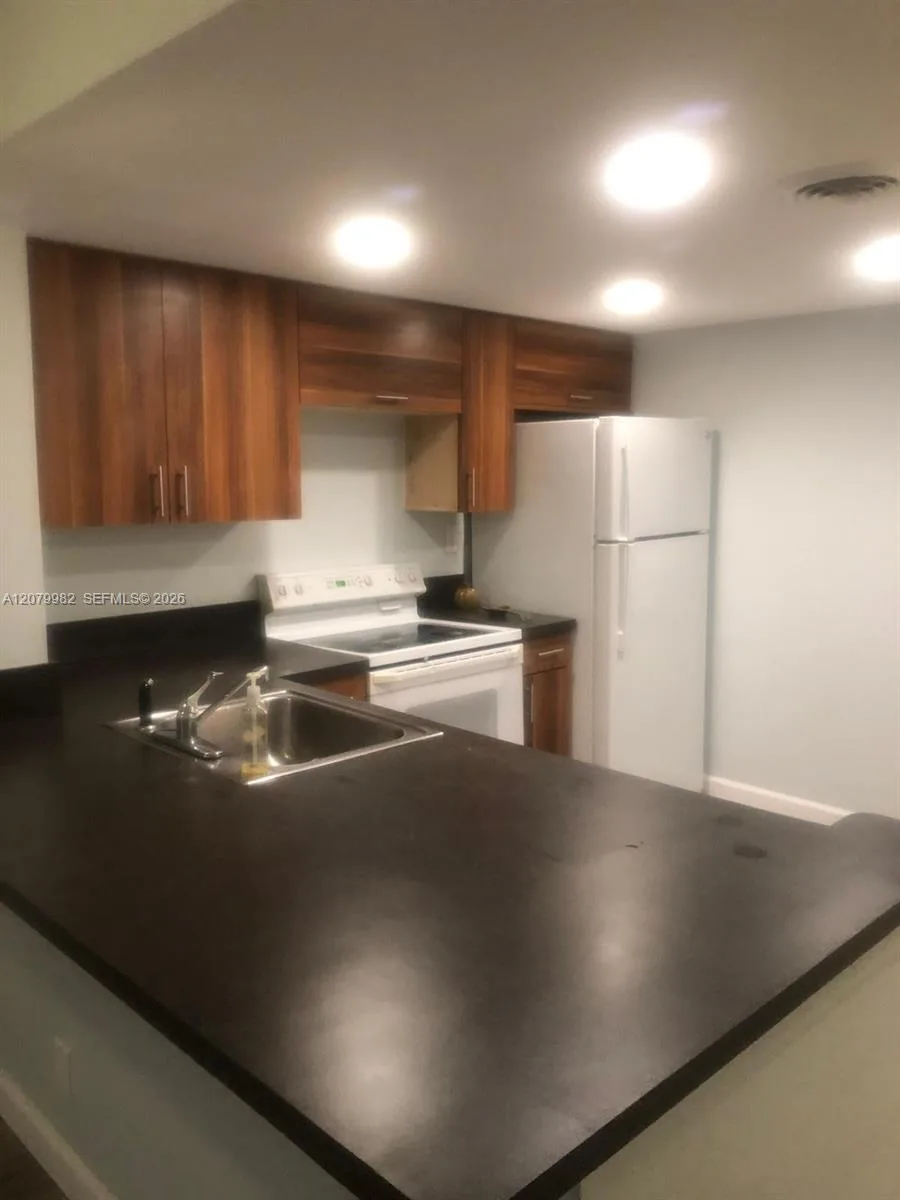 3700 N Pine Island Rd # 202, Sunrise, FL 33351