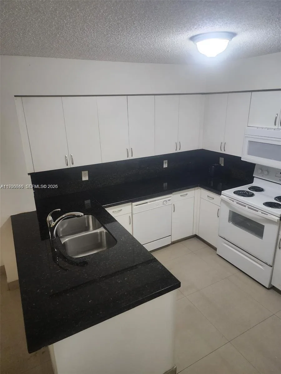 4560 NW 107th Ave # 207-12, Doral, FL 33178 photo 2
