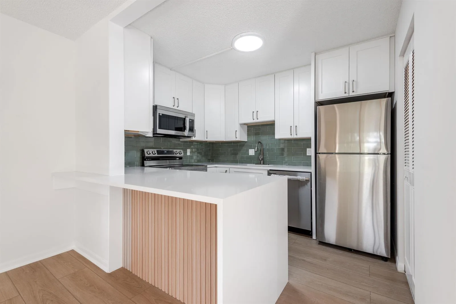 3561 Tall Pine Way # D-2, FL 33463