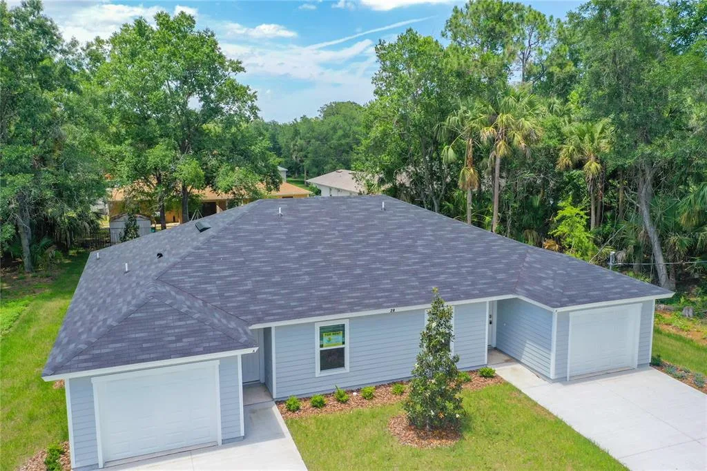 38 SLUMBER MEADOW TRAIL, PALM COAST, FL 32164