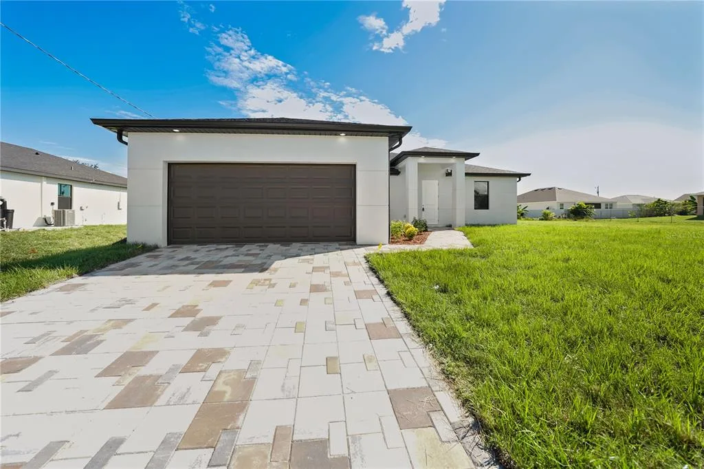 2458 NW 9TH TERRACE, CAPE CORAL, FL 33993