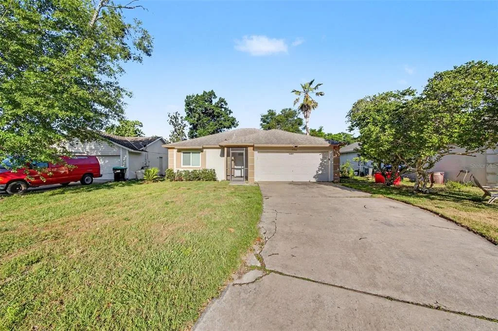 7734 LAKESIDE WOODS DRIVE, ORLANDO, FL 32810