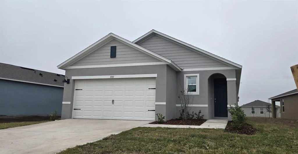 7171 CARIB GRACKLE DRIVE, HARMONY, FL 34773