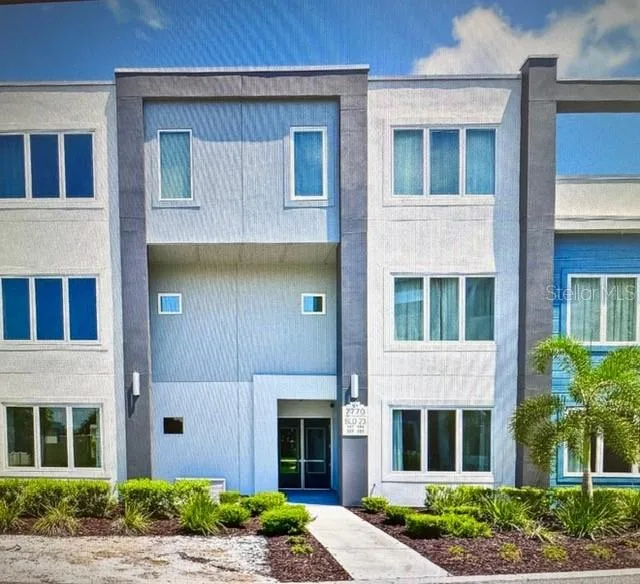 7770 SANDY RIDGE DRIVE # 207, REUNION, FL 34747