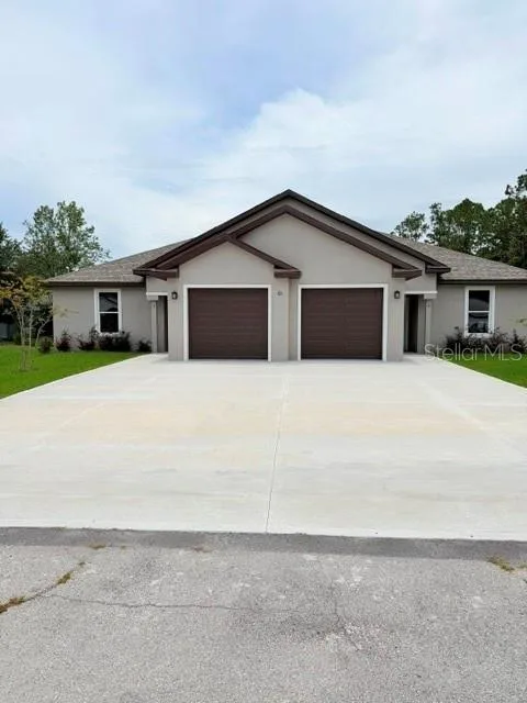 16 SLUMBERLAND PATH # B, PALM COAST, FL 32164