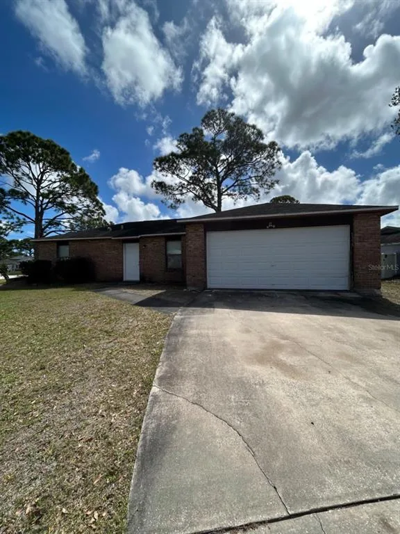 1395 COX AVENUE NW, PALM BAY, FL 32907
