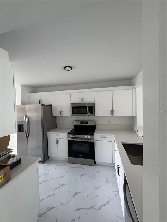 7751 SOUTHAMPTON TERRACE # 213, TAMARAC, FL 33321