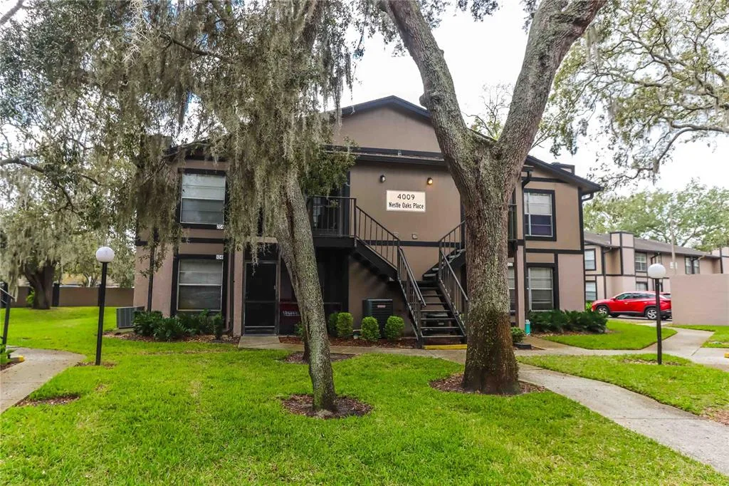4009 NESTLE OAKS PLACE # 104, TAMPA, FL 33613