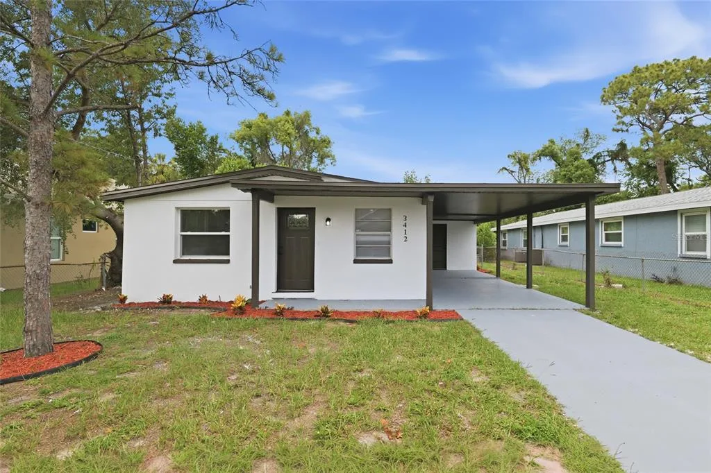 3412 E HENRY AVENUE, TAMPA, FL 33610