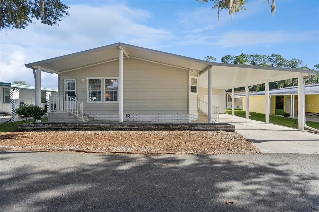 212 PALM MEADOWS DRIVE, EUSTIS, FL 32726